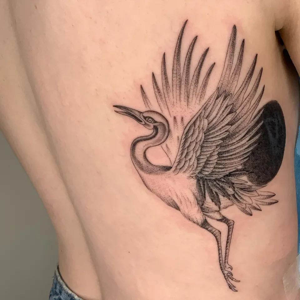 Tatouage « Grue et lune noire »