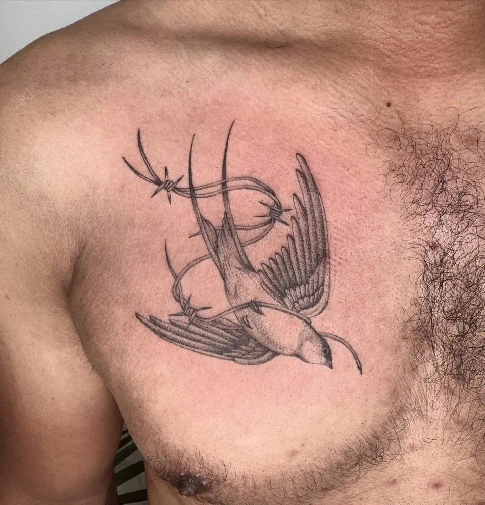 Tatouage « Hirondelle à l'épine »