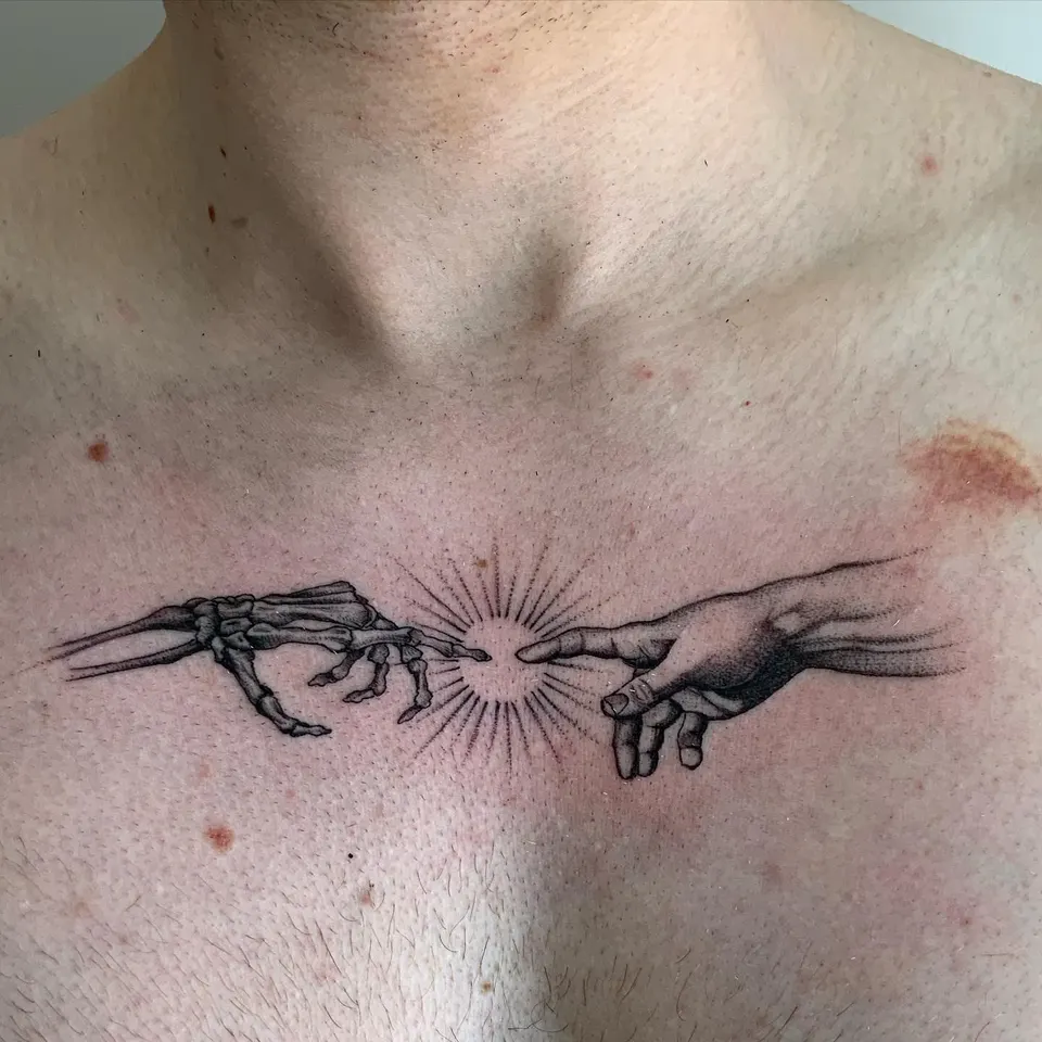 Tatouage « La Création, version squelette »